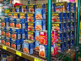 donated Spam on pantry shelf
